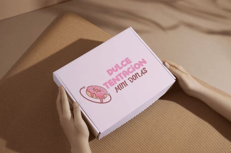 Logo de Dulce y Tentación en mockup de caja
